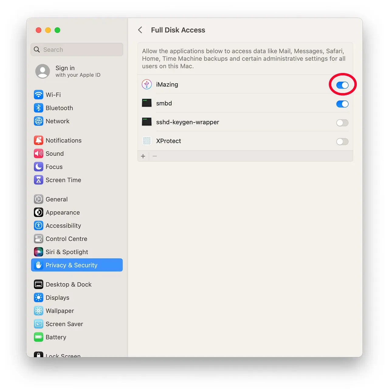 Drag and dropping iMazing icon to Full Disk Access preferences GIF